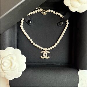 CHANEL Pearl Necklace with Gold-Tone Interlocking CC Pendant